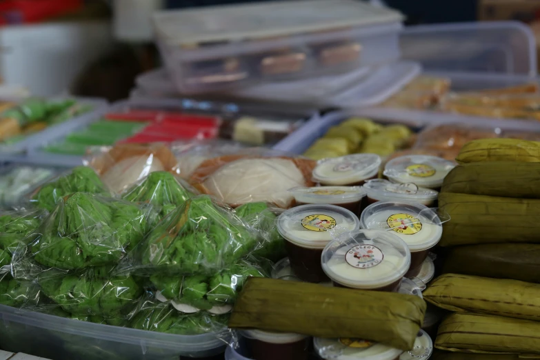 plastic containers and containers with food items in them