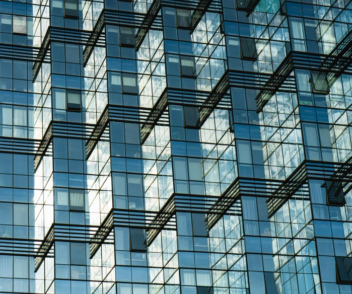 a tall, glassy building with many windows