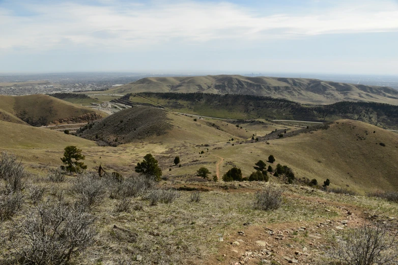 a hill with a road on top of it