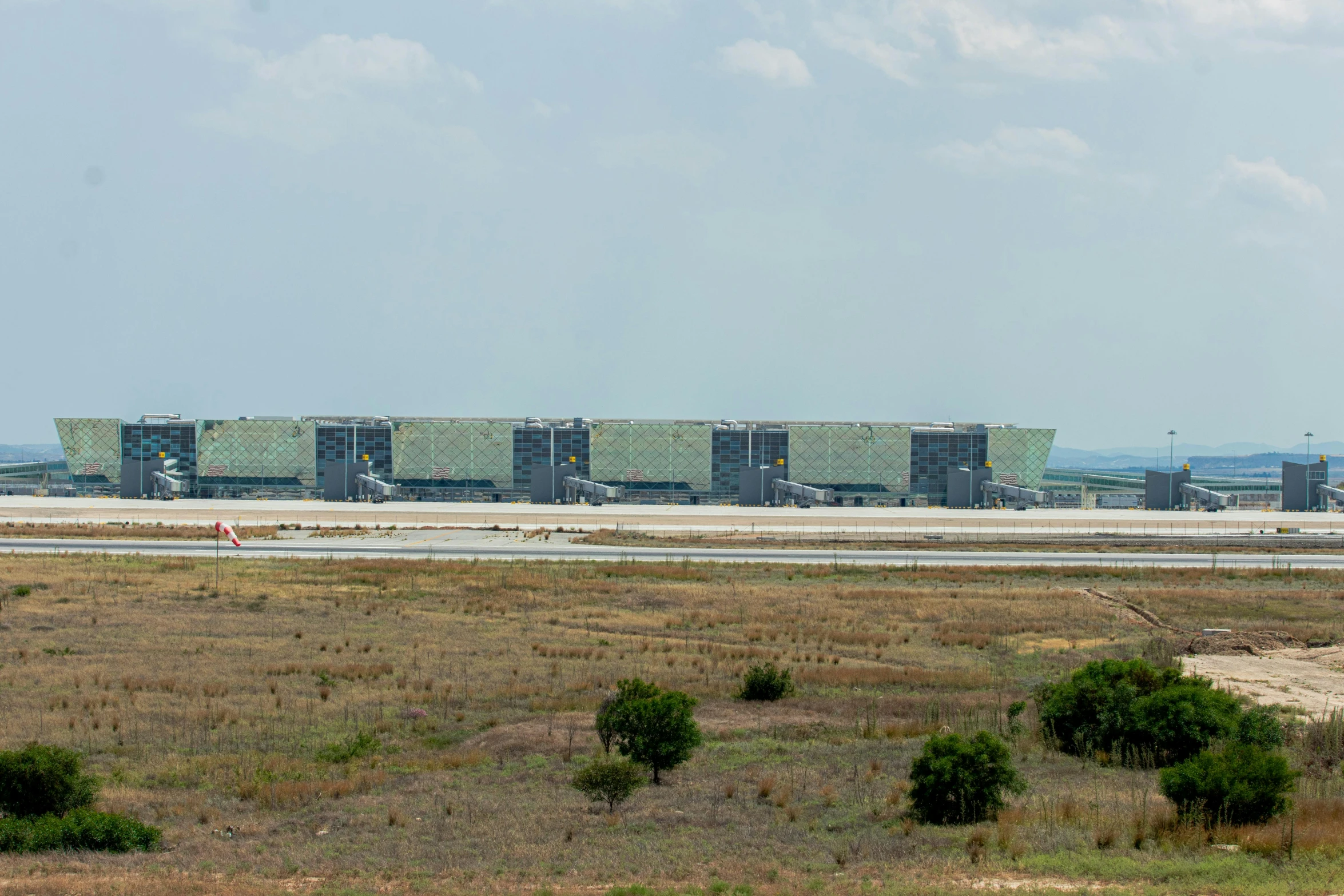 a large airplane sitting on top of an airport runway