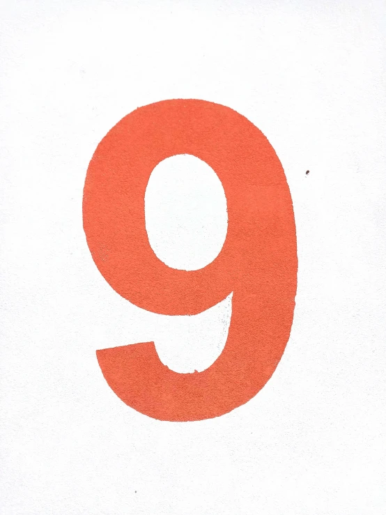 a red number nine is placed in the shape of an image