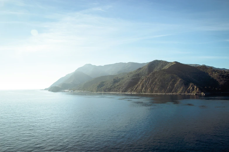 view of a small bay with mountains next to it