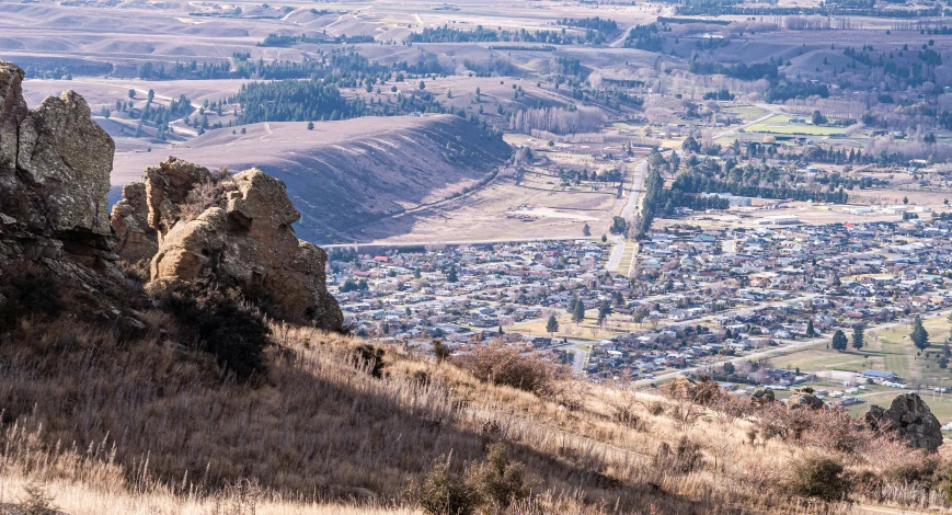 the town sits atop a hill overlooking a valley