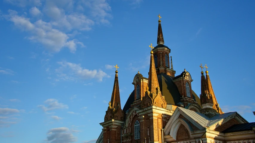 church with spires is the centerpiece of this large building