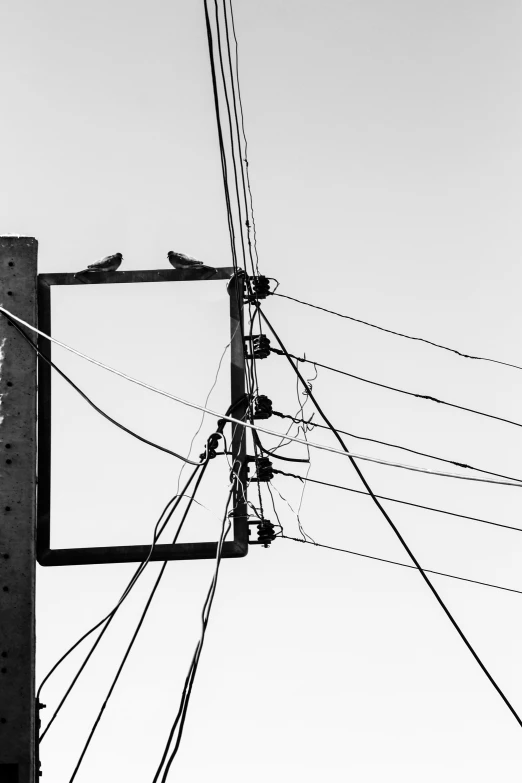 several power lines above a street