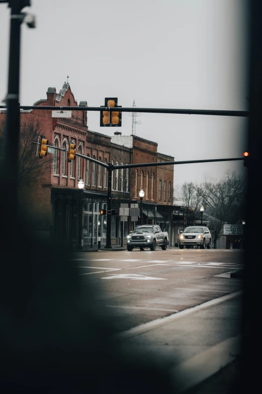 a large brown building sitting on the corner of a street