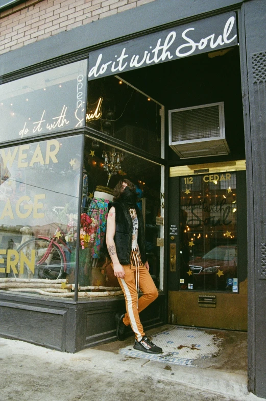 a man is in the doorway of a store