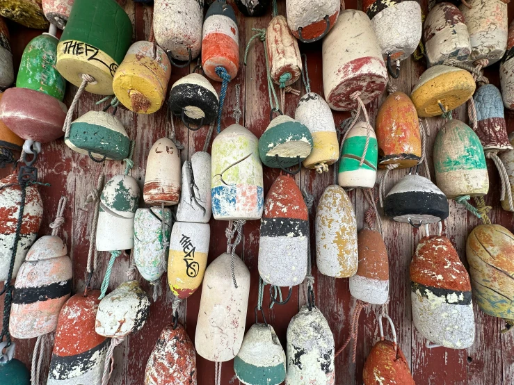 rows of colorful small wooden boats caps