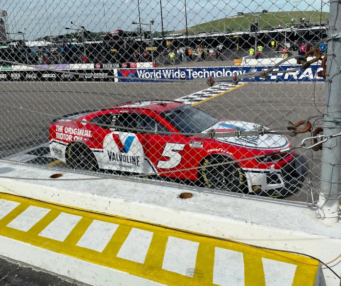 a car driving down the track at an indy