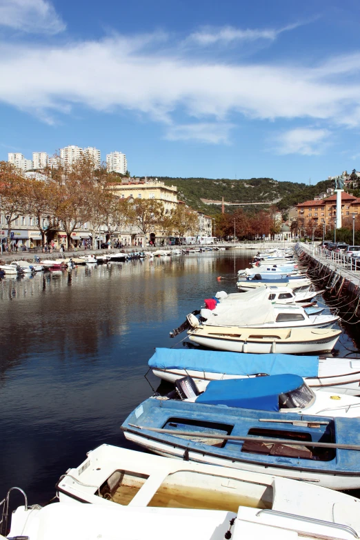 the boats are sitting in the water