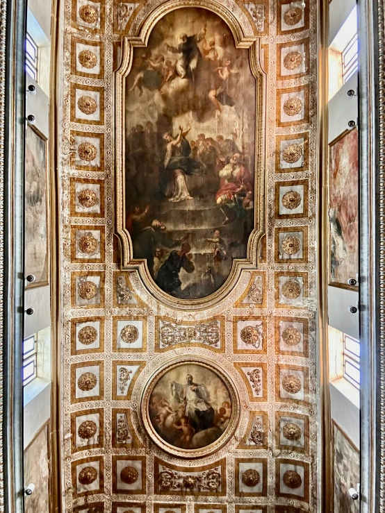 this beautiful church has a large painting on the ceiling