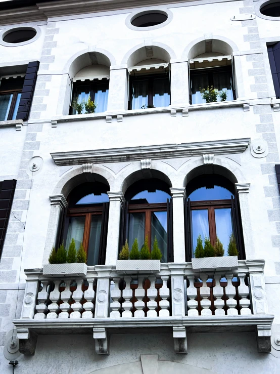 a balcony is shown with windows and balconies