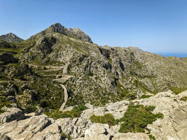 the view from the top of a rocky peak