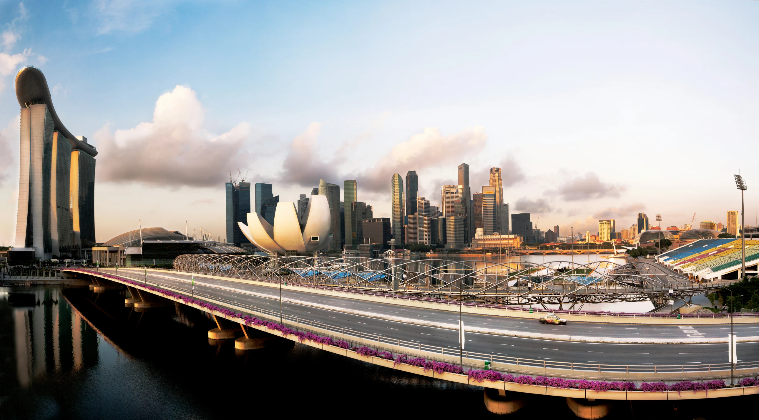 a view of a city skyline with some bikers