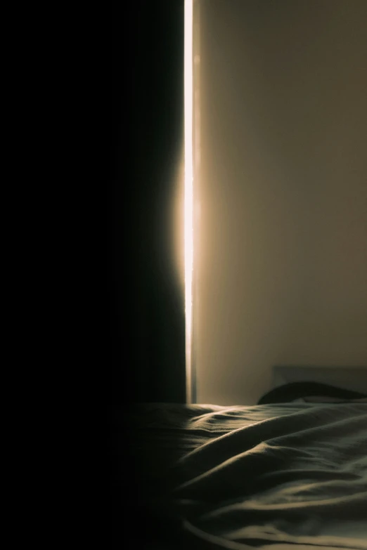 a view into the light behind a bed