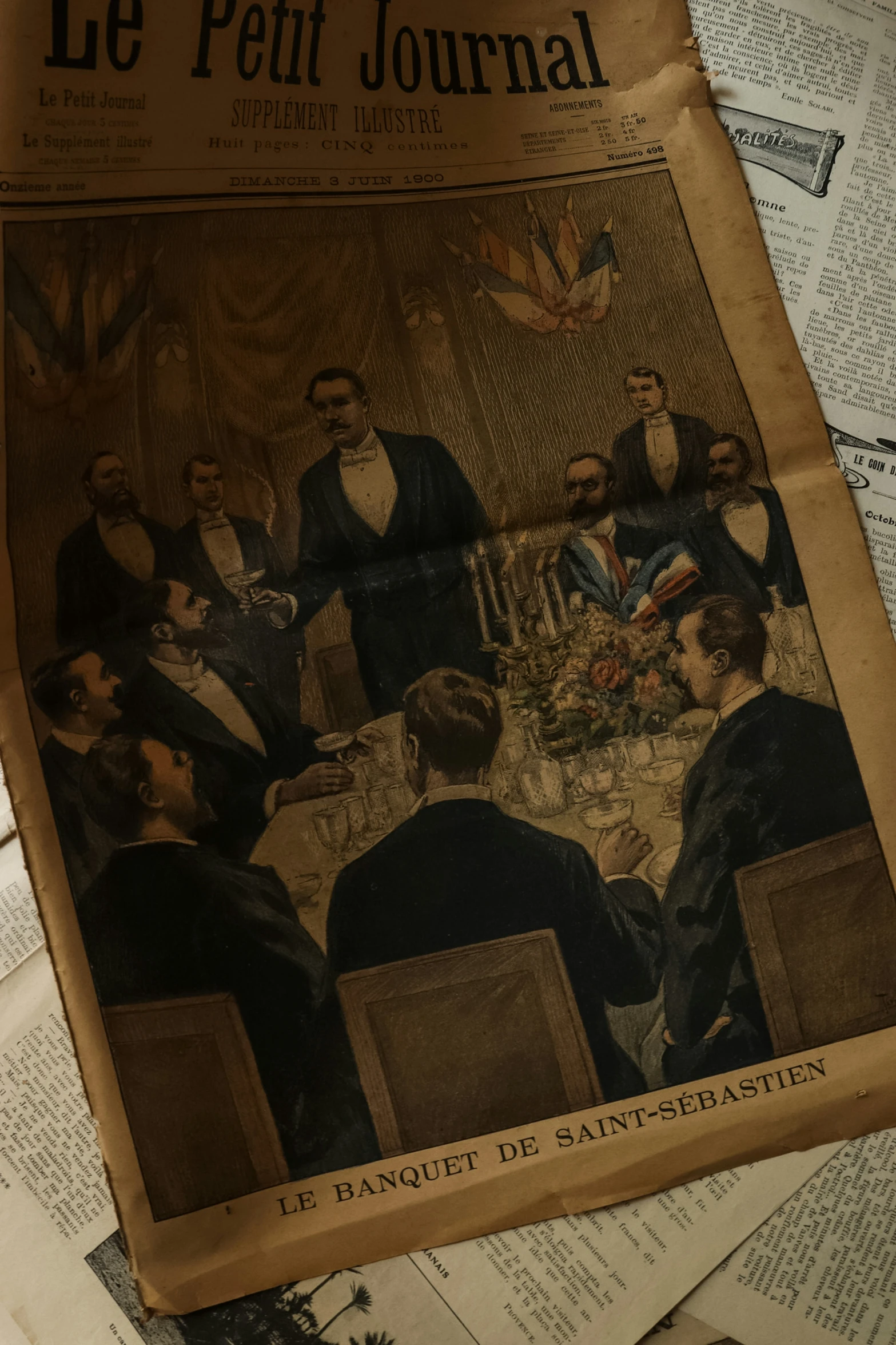 a newspaper with an illustration of a group of people sitting at a dinner table