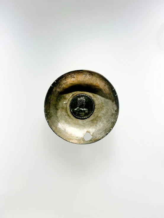 an overhead view of a ss bowl in the middle of a room