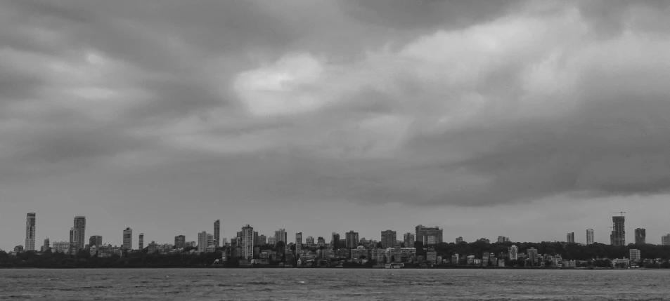 a body of water in front of a city