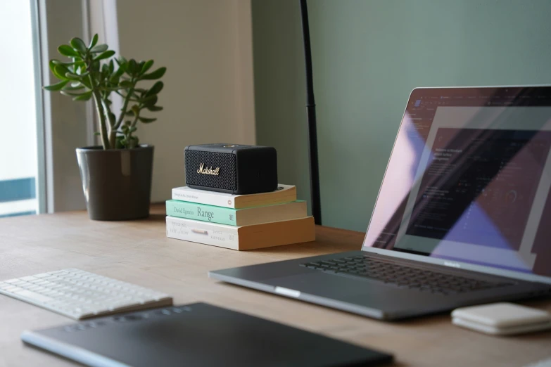 a desktop computer sitting on top of a wooden desk