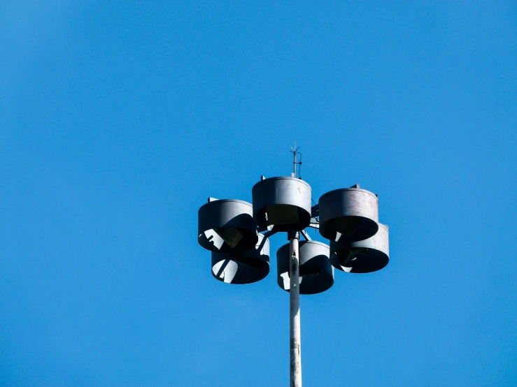 the street light stands tall on the clear day