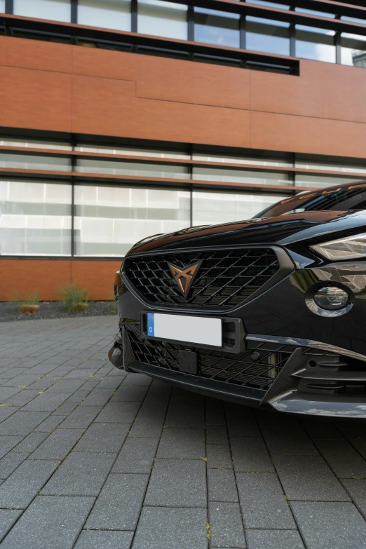 a close up of a car in front of a building