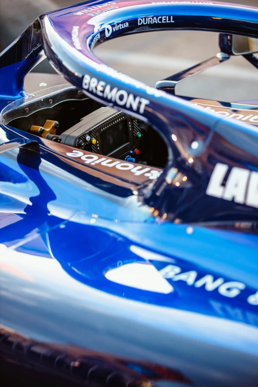 the front end of a racing car with the numbers 11 on it