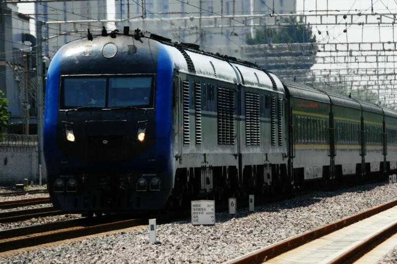 a very long train on a steel track