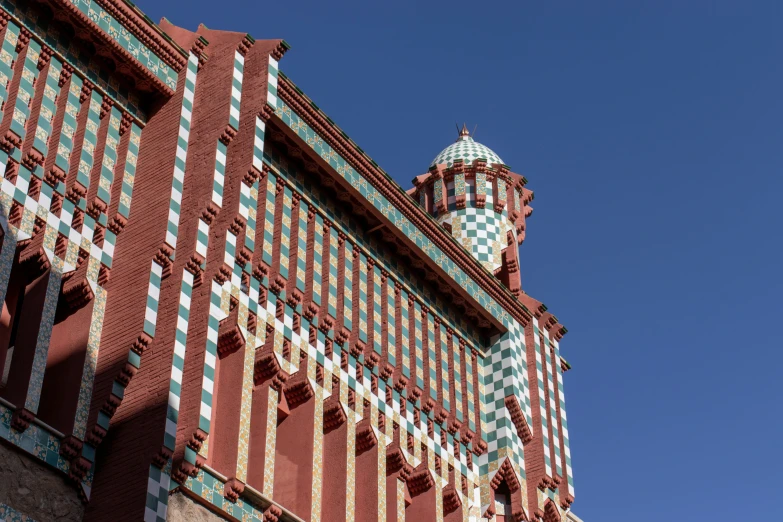 a large colorful building with a clock on top