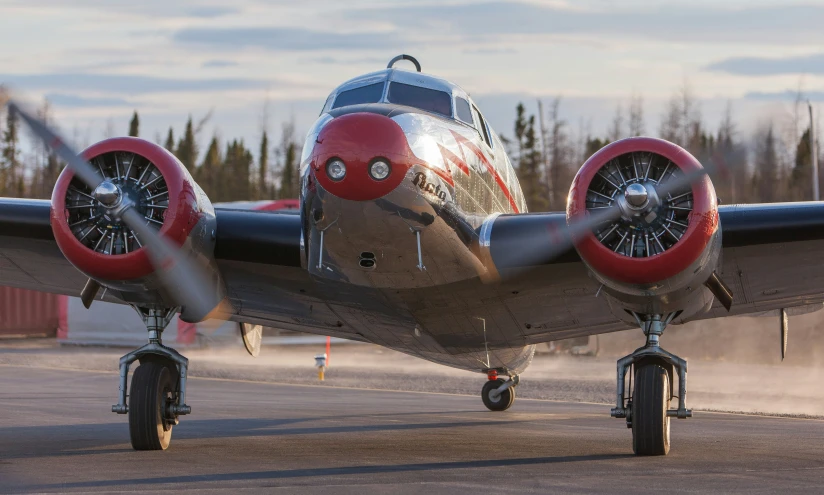 a plane that is on some concrete outside