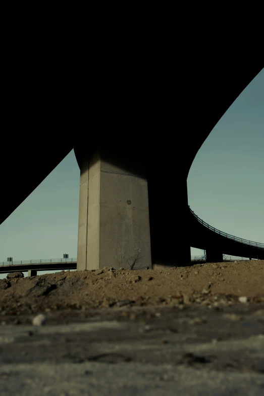 an image of under ground view of some bridges