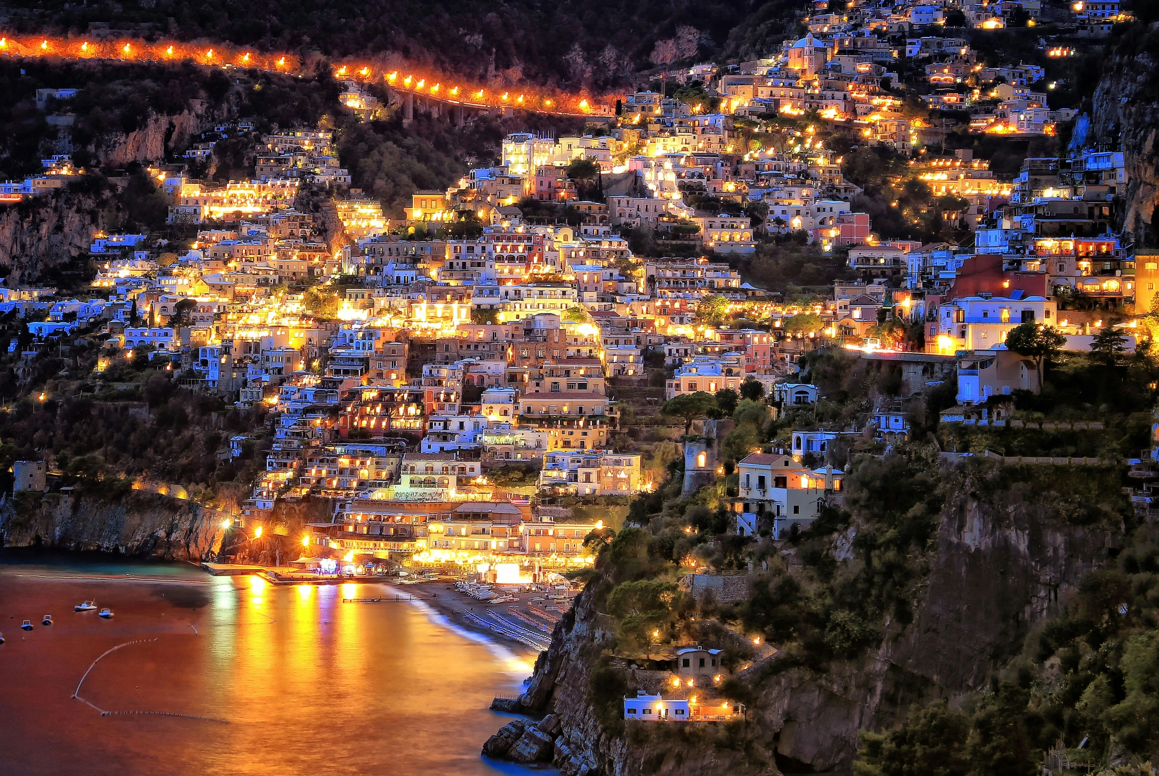 night in the village and on the cliff of a hill by the beach