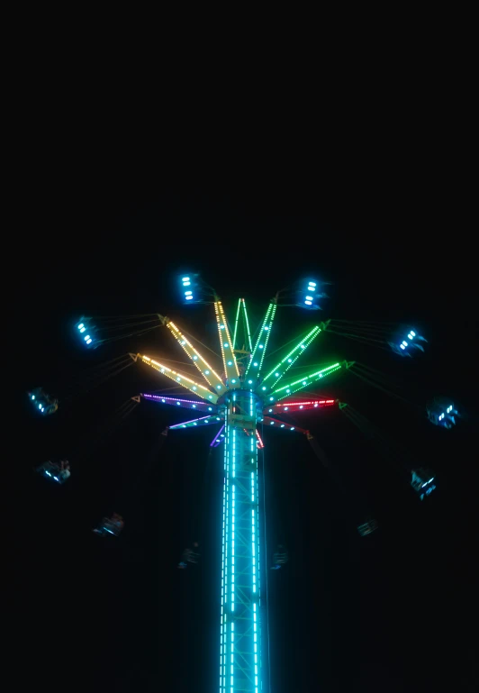 a large fireworks show in the sky with lights on