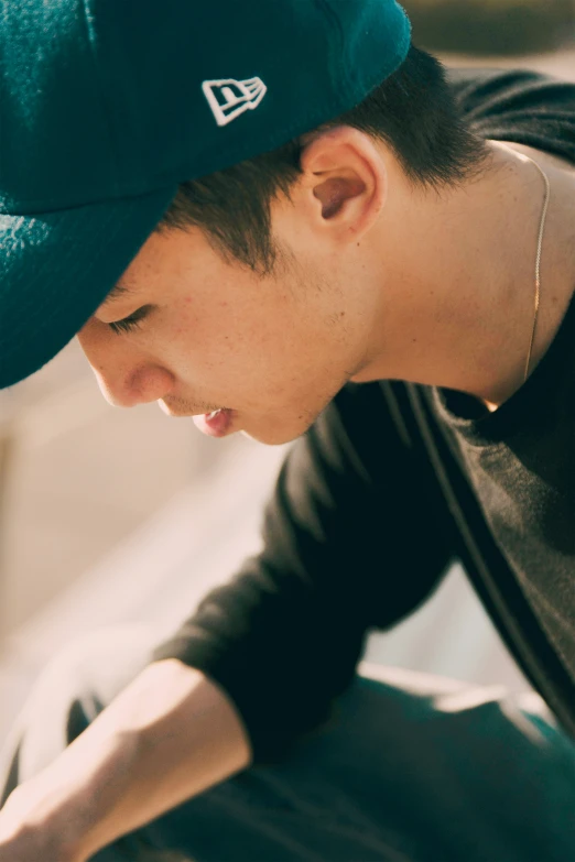 a young man with a cell phone in his hand