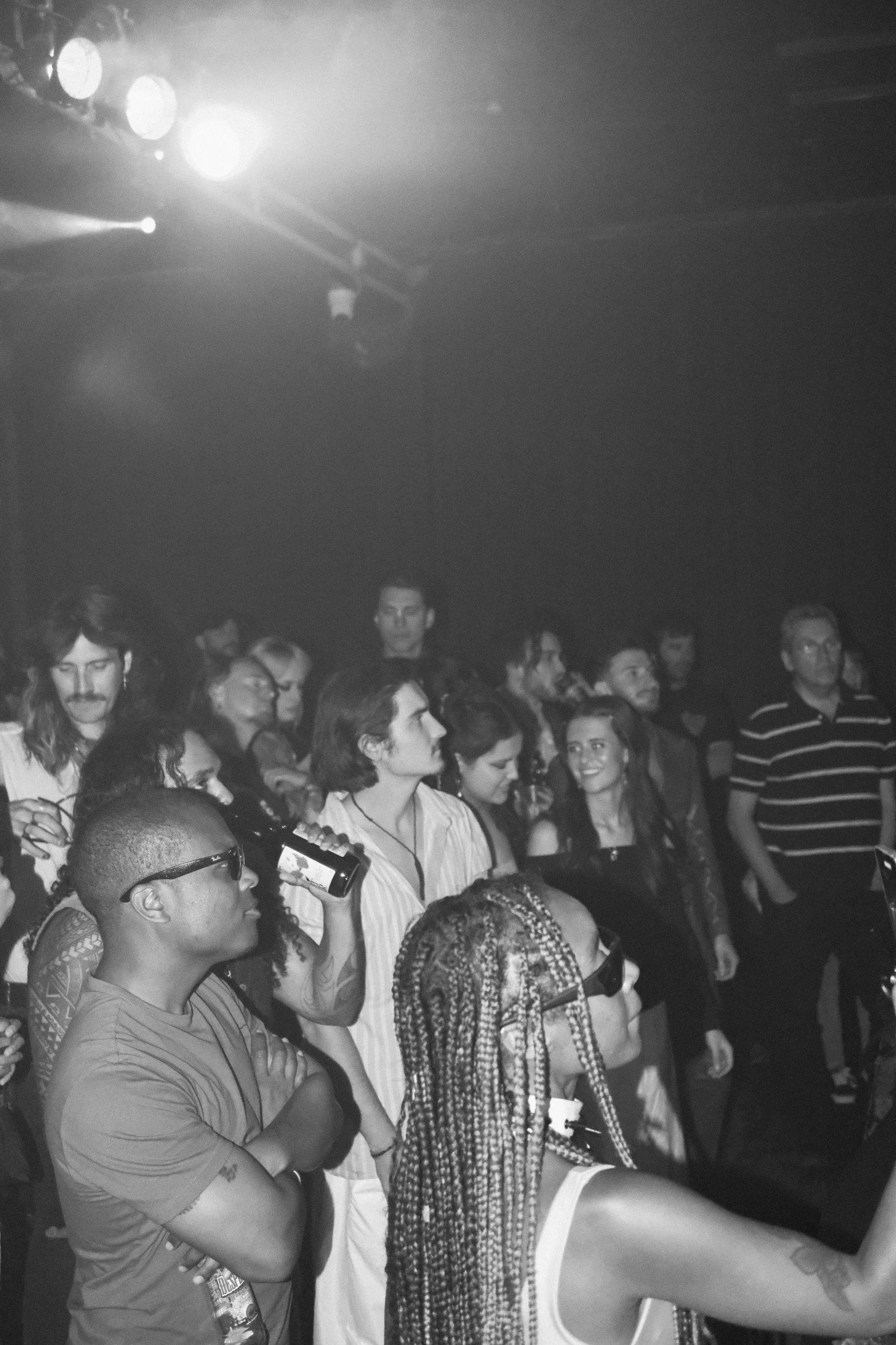 black and white pograph of people at a party