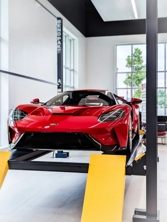 an image of a car being serviced by a machine