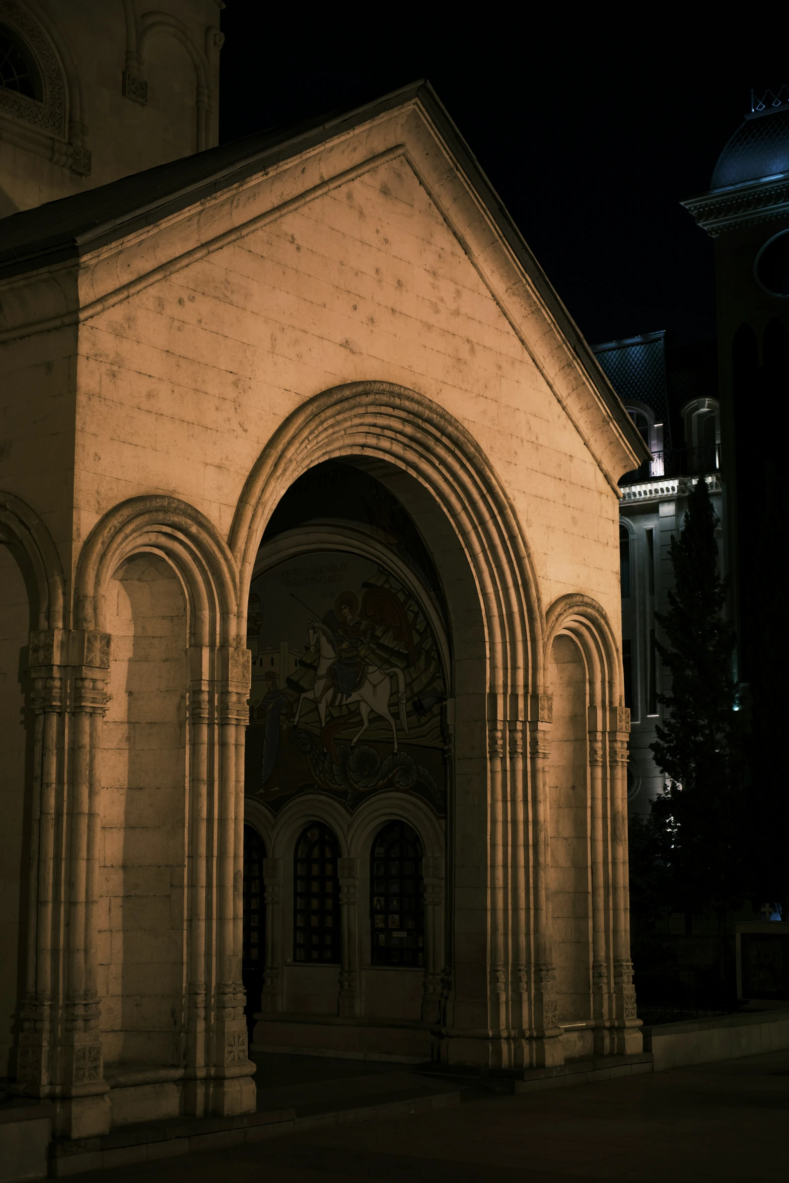 large cathedral with elaborate architecture at night