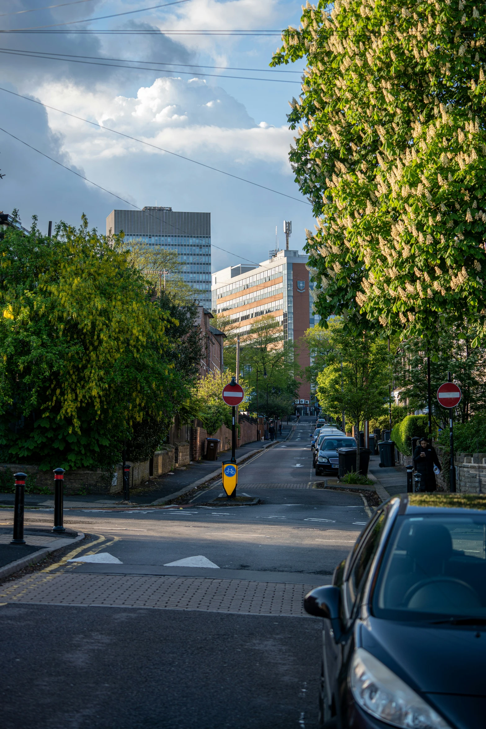 some cars parked on a city street