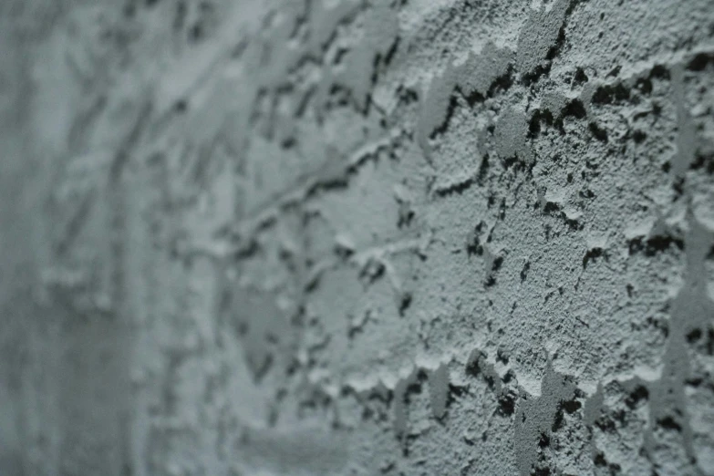 the texture is painted on a wall in black and white