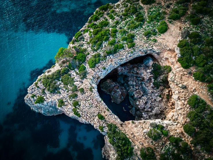 an aerial po of the island and its surrounding rocks