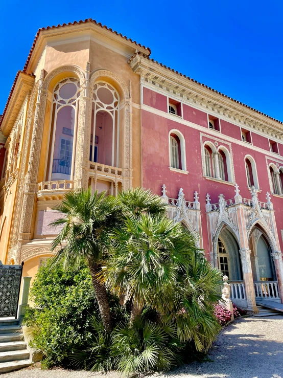 an elegant building with intricate carved balconies