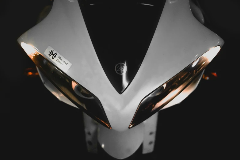 a close up of a motorcycle with shiny silver chrome