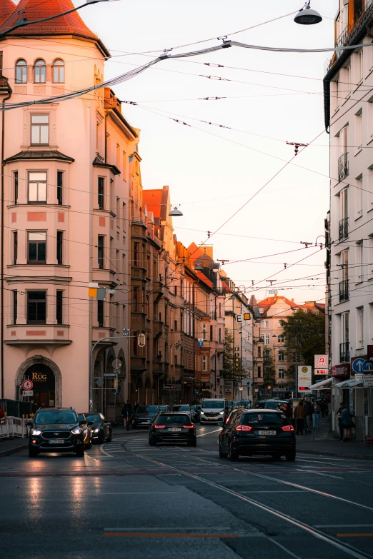 some cars parked and lights and buildings