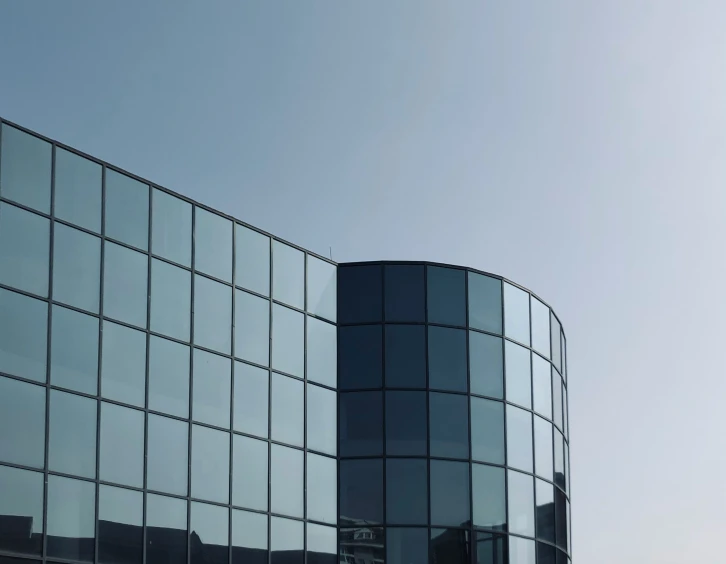 the exterior view of two modern buildings of a city