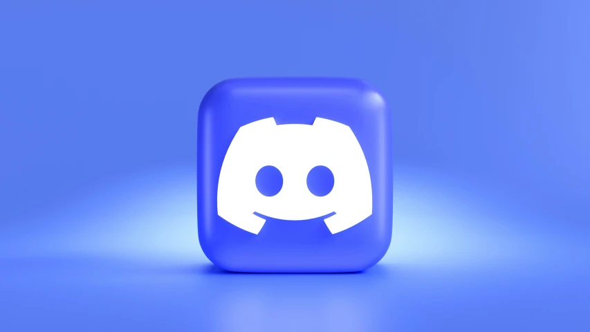 a square, plastic blue on with a smiley face on it