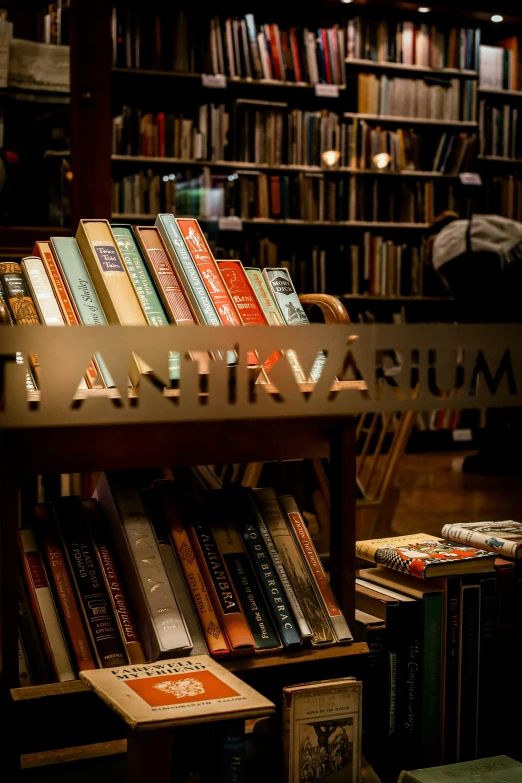 a bookshelf full of books in a dark room