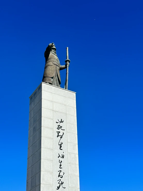 the giant statue is located on a building