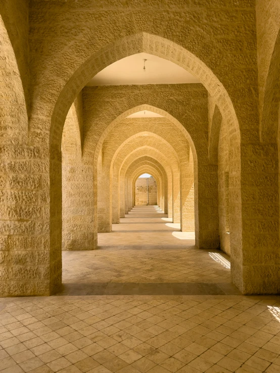 a walkway is in a tunnel with no people in it