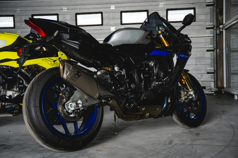 motorcycle parked near another motorcycle in garage