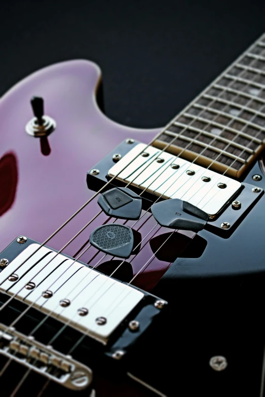 an electric guitar is shown with its neck missing