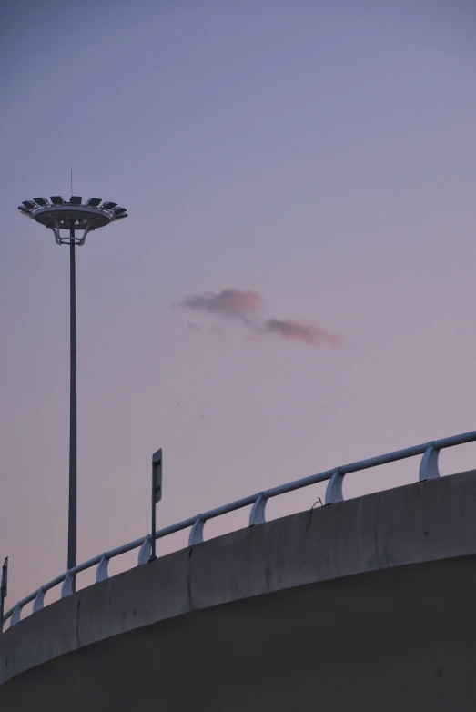 a view of the sun going down at the stadium